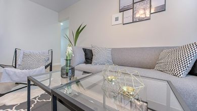 grey sofa and rectangular glass top coffee table